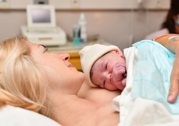 a person holding a baby